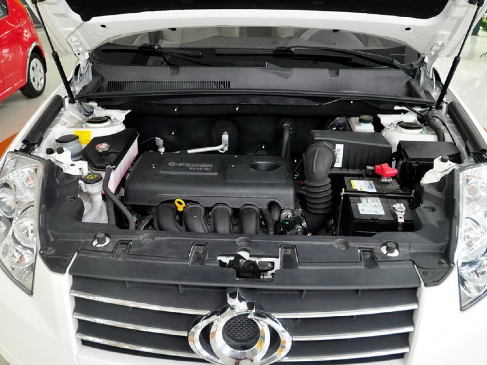 Двигатель emgrand x7. Geely Emgrand x7 двигатель 1.8. Geely Emgrand x7 под капотом. Jelly MK 2013 под капотом. Geely Emgrand x7 мотор.